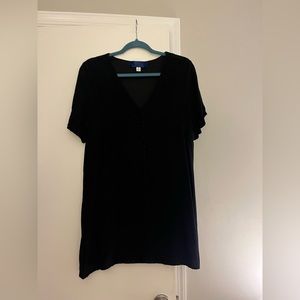 Black dress with buttons. Medium sized.